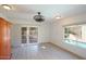 Light-filled living room showcasing pool views and wood-look floors at 320 W Cypress St, Phoenix, AZ 85003