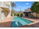 Inviting pool and spa area with pergola and comfortable seating at 320 W Cypress St, Phoenix, AZ 85003