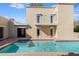 Stunning pool and spa with terracotta tile and modern home view at 320 W Cypress St, Phoenix, AZ 85003