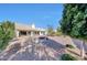 Relaxing backyard patio with desert landscaping at 3439 E Topeka Dr, Phoenix, AZ 85050