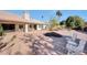 Spacious backyard with a patio, desert landscaping and seating at 3439 E Topeka Dr, Phoenix, AZ 85050