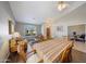 Dining room with wood floors and access to the living room and kitchen at 3439 E Topeka Dr, Phoenix, AZ 85050