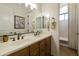 Well-lit bathroom with dual sinks, granite counters, and updated fixtures at 350 W Yellowstone Way, Chandler, AZ 85248