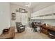 Bright bedroom with shuttered windows, desk and office furniture, and comfortable seating at 350 W Yellowstone Way, Chandler, AZ 85248