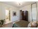 Bedroom with neutral walls, closet, and full bath at 350 W Yellowstone Way, Chandler, AZ 85248