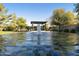 Backyard fountain surrounded by lush greenery at 350 W Yellowstone Way, Chandler, AZ 85248