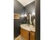 Well-lit powder room with modern fixtures and attractive decor at 350 W Yellowstone Way, Chandler, AZ 85248