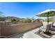 Relaxing balcony featuring seating, scenic views, and a shaded area for outdoor enjoyment and privacy at 3652 N Sonoran Hts, Mesa, AZ 85207