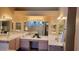 Bathroom featuring dual vanities, mirrors, and sconce lighting at 3652 N Sonoran Hts, Mesa, AZ 85207