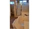 Bathroom featuring a large bathtub and separate gold-trimmed shower stall at 3652 N Sonoran Hts, Mesa, AZ 85207