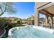 Relax in this backyard hot tub while enjoying views of the desert landscape and mountain scenery in the distance at 3652 N Sonoran Hts, Mesa, AZ 85207