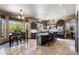 A luxurious kitchen features high-end appliances, a wine fridge, and views of the landscape at 3652 N Sonoran Hts, Mesa, AZ 85207