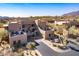 Aerial view of a community of stucco homes at 36601 N Mule Train Rd # B40, Carefree, AZ 85377