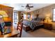 Main bedroom with king-size bed and southwestern decor at 36601 N Mule Train Rd # B40, Carefree, AZ 85377