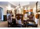 Dining area with a large table and cowhide chairs at 36601 N Mule Train Rd # B40, Carefree, AZ 85377