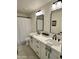 Modern bathroom with double vanity, updated fixtures and hexagonal tile floors at 3743 W Shannon St, Chandler, AZ 85226