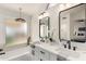 Modern bathroom with double vanity and soaking tub at 3743 W Shannon St, Chandler, AZ 85226