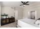 Bedroom with ceiling fan and built-in storage at 3743 W Shannon St, Chandler, AZ 85226