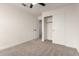 Bedroom with mirrored closet doors and ceiling fan at 3743 W Shannon St, Chandler, AZ 85226