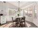 Bright dining area with round table and chairs, near kitchen at 3743 W Shannon St, Chandler, AZ 85226