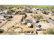 Aerial view of desert home featuring a swimming pool, horse facilities, and covered parking for RV at 3791 E Vista Grande Dr, San Tan Valley, AZ 85140