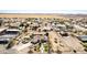 Aerial view of desert home showcasing circular driveway, lush landscaping, and spacious property at 3791 E Vista Grande Dr, San Tan Valley, AZ 85140