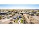 Expansive aerial view of a grand property featuring mature trees, a circular driveway and desert landscaping at 3791 E Vista Grande Dr, San Tan Valley, AZ 85140