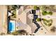 Birds-eye-view of a large residence with a pool, outdoor entertaining area, and circular driveway at 3791 E Vista Grande Dr, San Tan Valley, AZ 85140