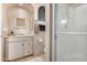 Bathroom showcasing a shower, vanity with granite countertop, cabinet storage, and modern neutral finishes at 3791 E Vista Grande Dr, San Tan Valley, AZ 85140