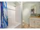 Bathroom featuring a shower/tub combo, vanity with storage, and a decorative mirror at 3791 E Vista Grande Dr, San Tan Valley, AZ 85140