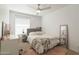 Cozy bedroom with a queen-size bed and mirrored closet at 3910 W Michigan Ave, Glendale, AZ 85308