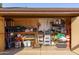 Organized garage with various tools and storage containers at 3910 W Michigan Ave, Glendale, AZ 85308