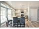 Modern kitchen with granite countertops, stainless steel appliances, and light-colored cabinetry at 3910 W Michigan Ave, Glendale, AZ 85308