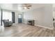 Living room with hardwood floors, and a shoe storage at 3910 W Michigan Ave, Glendale, AZ 85308