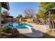 Relaxing backyard with a refreshing blue pool, patio furniture and gazebo at 3910 W Michigan Ave, Glendale, AZ 85308