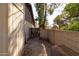 Side yard access with gate and dog kennel at 3910 W Michigan Ave, Glendale, AZ 85308