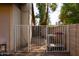 Side yard with gate and storage cart at 3910 W Michigan Ave, Glendale, AZ 85308