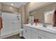 Bathroom with double vanity, shower, and toilet at 42157 W Cribbage Rd, Maricopa, AZ 85138