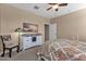 Spacious bedroom with dresser, chair, and large window at 42157 W Cribbage Rd, Maricopa, AZ 85138