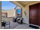 Cozy patio area with seating, ideal for relaxing or entertaining guests at 42157 W Cribbage Rd, Maricopa, AZ 85138