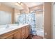 Bathroom with double vanity, bathtub and shower at 42621 W Heavenly Pl, Maricopa, AZ 85138