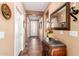 View of entryway with tile floor, console table, and mirror at 42621 W Heavenly Pl, Maricopa, AZ 85138