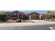 Charming single-story home with a two-car garage and desert landscaping at 42621 W Heavenly Pl, Maricopa, AZ 85138