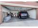 Spacious garage with room for one car and storage at 42621 W Heavenly Pl, Maricopa, AZ 85138