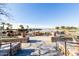 Spacious lakeside patio with comfortable seating at 42621 W Heavenly Pl, Maricopa, AZ 85138