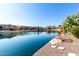 Tranquil lakefront property with scenic views and walking paths at 42621 W Heavenly Pl, Maricopa, AZ 85138