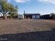 Spacious backyard with ample parking, a storage shed and a gravel surface at 44311 N 1St Dr, New River, AZ 85087