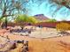 Landscaped backyard with a rock garden and desert plants at 44311 N 1St Dr, New River, AZ 85087