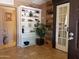 Foyer area with built in shelves is situated near a door at 44311 N 1St Dr, New River, AZ 85087