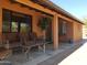 Inviting front porch featuring outdoor seating, neutral walls, and an inviting entry at 44311 N 1St Dr, New River, AZ 85087